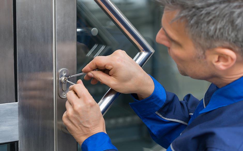 changer serrure porte garage basculante Paris 19